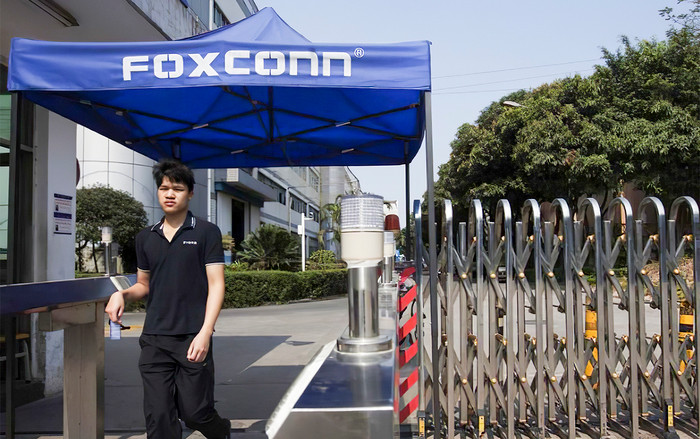 Nghịch lý ở 'thành phố iPhone': Làm ngoài giờ vừa là phần thưởng, vừa là hình phạt Ảnh 2