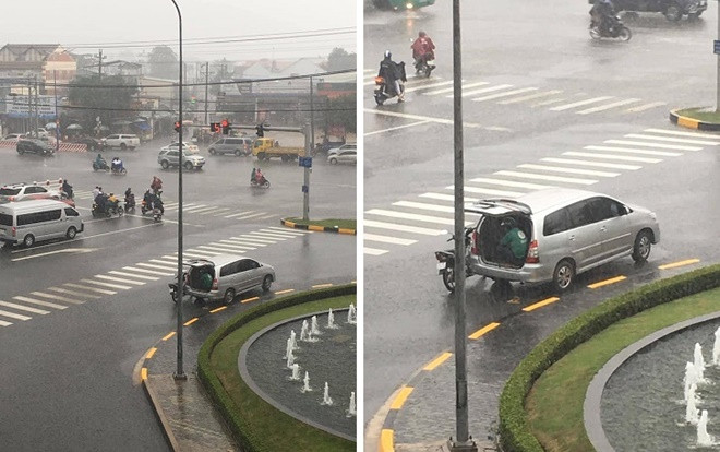 Ấm lòng hình ảnh tài xế ô tô mở luôn cốp sau cho anh Grab Bike trú nhờ giữa lúc trời mưa gió Ảnh 2