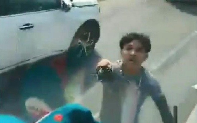 Truy tìm đôi nam nữ chặn đầu ô tô, dùng kiếm chém nát kính xe tải ở Bình Dương Ảnh 2