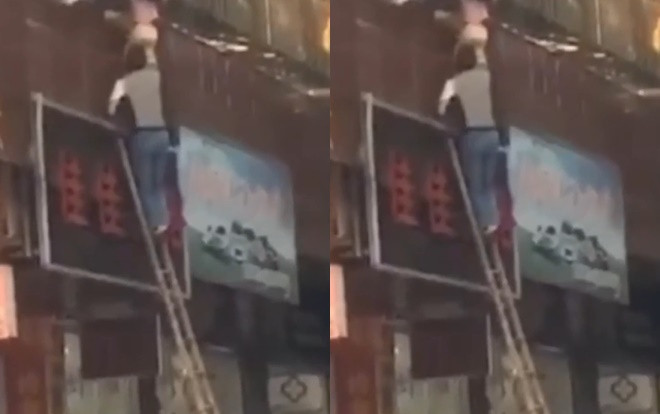 Bé trai nghịch ngợm khiến đầu bị kẹt, cả người lơ lửng ngoài ban công Ảnh 2