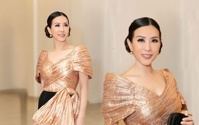 Hoa hậu Thu Hoài đeo nơ khổng lồ đi chấm thi sắc đẹp Ảnh 2