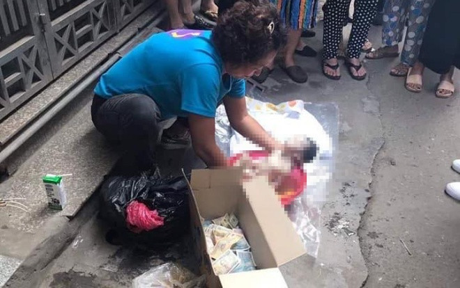 Xác định danh tính người mẹ cháu bé sơ sinh bị bỏ trong thùng rác ở Hà Nội Ảnh 2