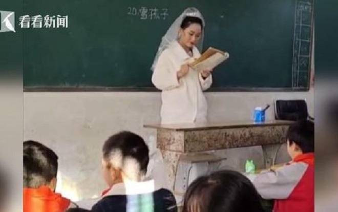 Cô giáo mặc váy cưới, đầu đội khăn voan đứng lớp dạy học trong ngày đưa dâu và lí do đặc biệt khiến ai cũng cảm động Ảnh 2