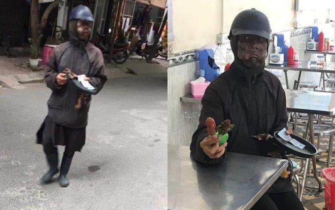 Hà Nội xuất hiện người mặc đồ đen cầm đầu gà, xúc xích đi xin tiền và sẵn sàng đánh lại gia chủ khi bị đuổi Ảnh 2