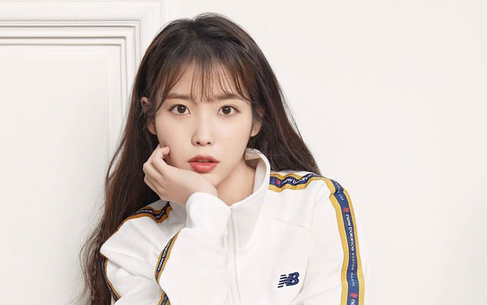 IU quyên góp 100 triệu won tiền từ thiện cho trẻ em hoàn cảnh khó khăn Ảnh 2