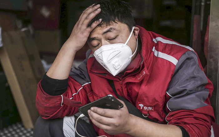 Nhà khoa học Trung Quốc phát hiện virus corona có thể trú ngụ trên điện thoại và máy tính Ảnh 2