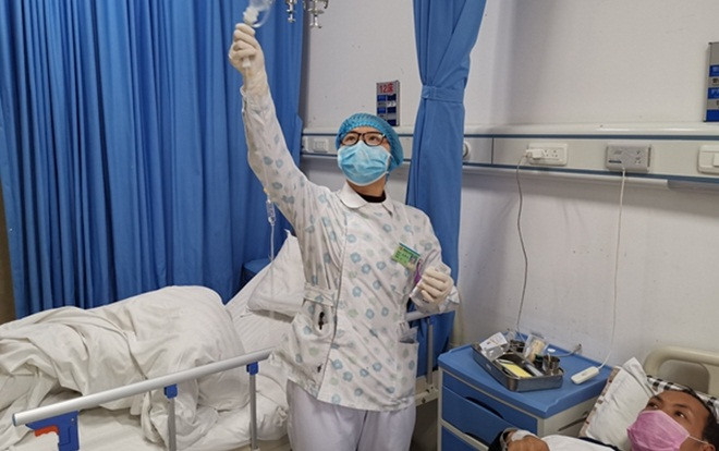 Những người hùng thầm lặng xông pha tuyến đầu chống virus corona Ảnh 2