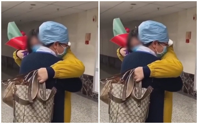 Bệnh nhân được chữa khỏi virus corona ra viện, ôm y tá bật khóc Ảnh 2