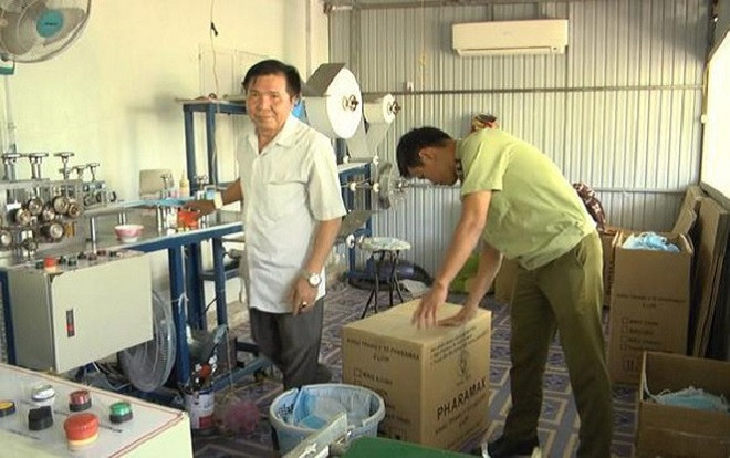 Phát hiện xưởng sản xuất khẩu trang không phép tại Bình Phước Ảnh 2