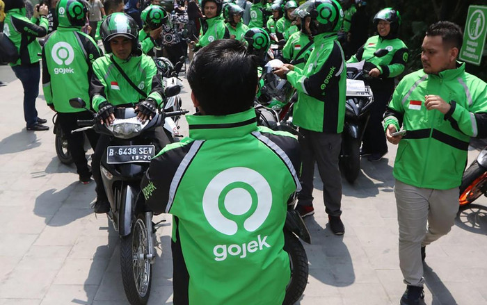 Grab và Go-Jek phải thay đổi cách giao đồ ăn vì virus corona chủng mới Ảnh 2