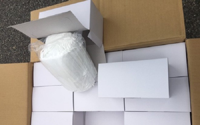 Tạm giữ 20.000 khẩu trang không nhãn mác Ảnh 2