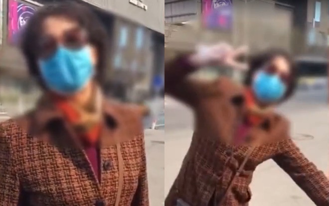 Người phụ nữ tạo dáng chụp ảnh thách thức nhân viên y tế Ảnh 2