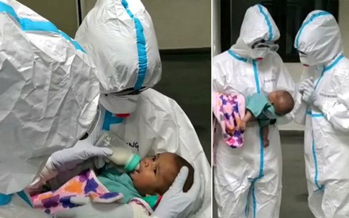 Y tá đồng lòng chăm sóc bé trai 3 tháng tuổi bơ vơ vì mẹ nhiễm COVID-19 Ảnh 2