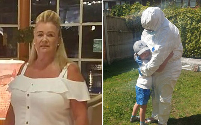 Người bà mặc đồ bảo hộ kín mít chỉ để ôm cháu trai một cái sau 7 tuần cách ly Ảnh 2