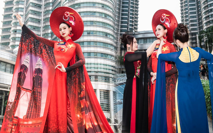 Bảo Ngọc diện áo dài rực đỏ, khoe chiều cao 'đụng nóc nhà' bên tháp đôi Malaysia Ảnh 2