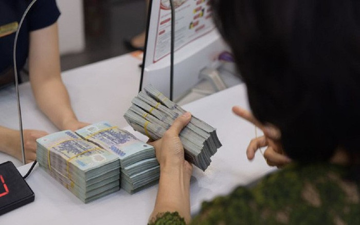 Người dân gửi tiết kiệm vào ngân hàng với con số kỷ lục: Hơn 6 triệu tỷ đồng Ảnh 2