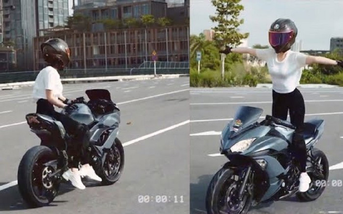 Người mẫu nổi tiếng lái mô tô thả 2 tay chưa lên làm việc, video bị gắn cảnh báo Ảnh 2