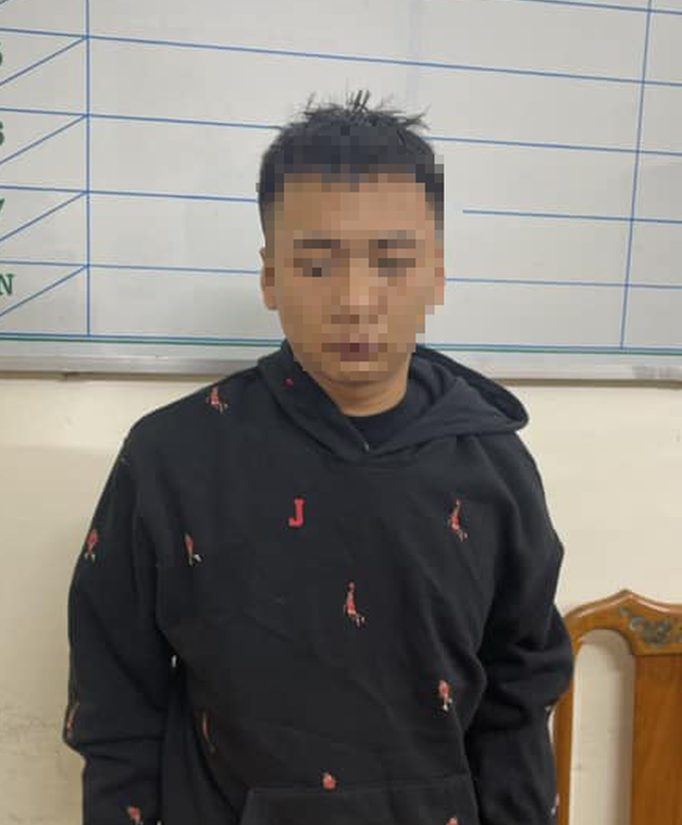 Hoàng Đức Long tại cơ quan điều tra (Ảnh Công an)