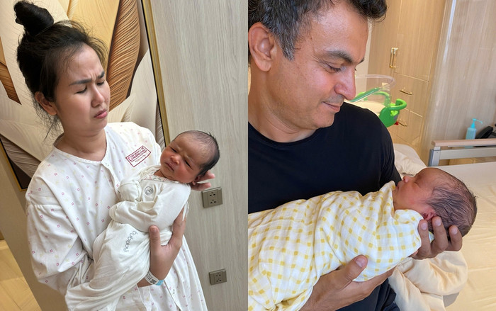 Nữ ca sĩ cho biết quý tử hợp tác khi được bố ẵm, còn lúc mẹ ẵm là biểu cảm khác hẳn. 