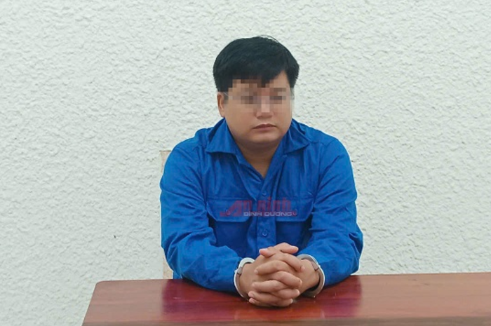 Văn Đình Lương tại Cơ quan điều tra. Ảnh: Công an Bình Dương