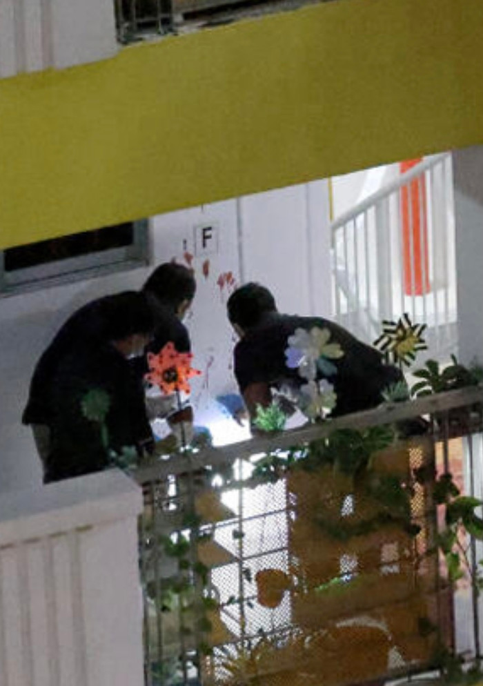 Hiện trường vụ án con trai sát hại cha tại Yishun, Singapore.