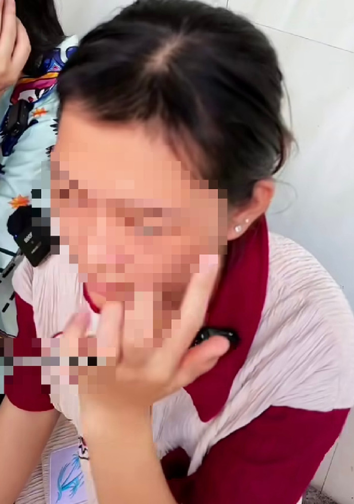 Công an cho biết thông tin về việc cô ruột xởn tóc, ép 2 cháu gái lấy chồng như trong nội dung của clip là không đúng sự thật. Ảnh cắt ra từ clip