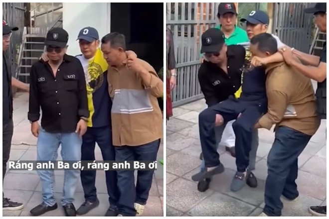 Nghệ sĩ Tấn Beo đi lại khó khăn nên được đồng nghiệp bế bổng.