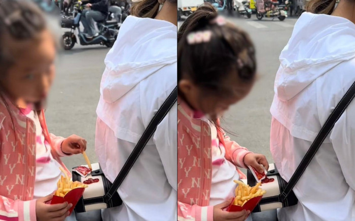 3 triệu người theo dõi bé gái ăn khoai tây chiên trên xe máy, dùng túi mẹ làm đĩa tương cà Ảnh 2