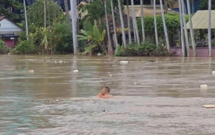 Đi tắm sông mùa lũ lụt, người đàn ông nhận cái kết không ngờ Ảnh 2