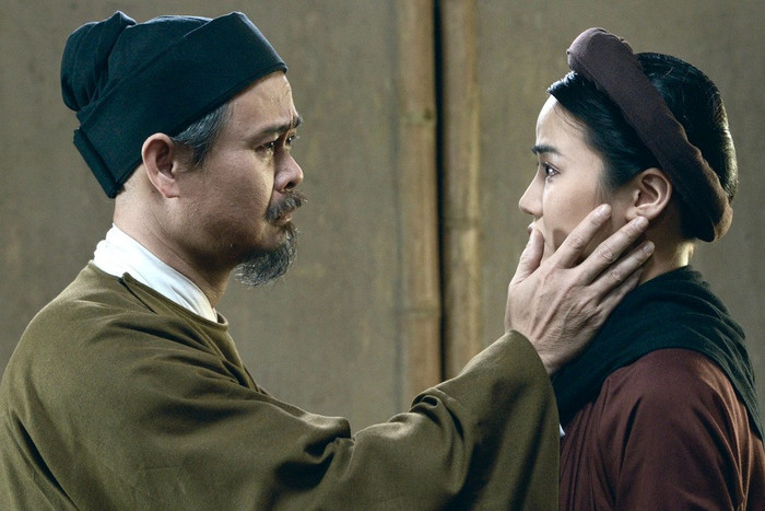 Anh Đào, Vĩnh Xương trong một cảnh phim Hồng Hà Nữ Sĩ. 