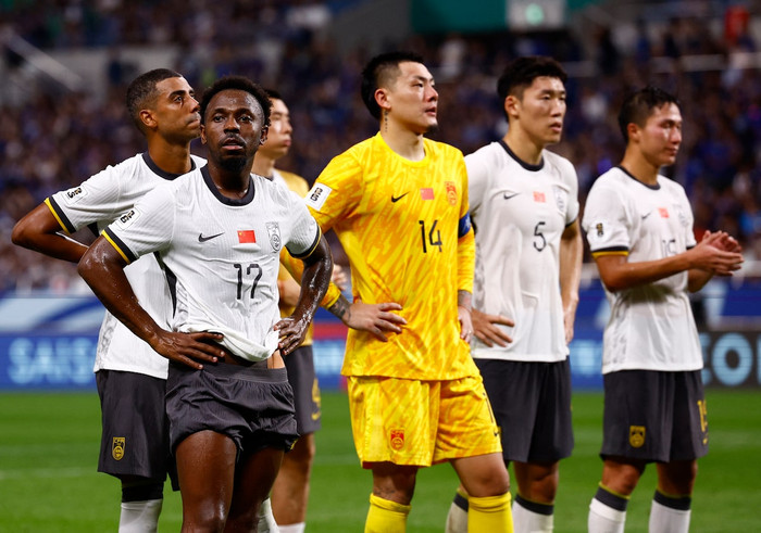 Tuyển Trung Quốc thua Nhật Bản 0-7 ở trận lượt đi. Ảnh: Reuters