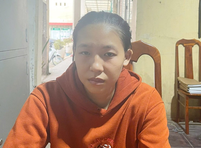 Đối tượng Lê Thị Ngọc Huyền tại cơ quan. Ảnh: Báo An Giang.