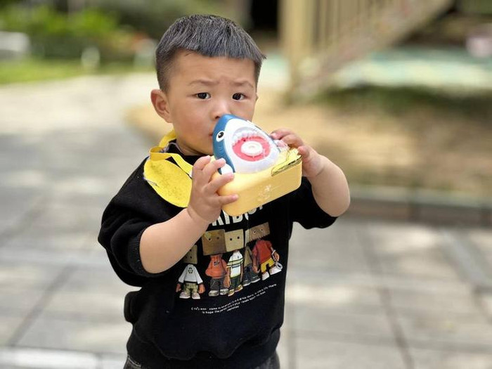 Xiao Xiao là đứa trẻ kháu khỉnh và ngoan ngoãn.