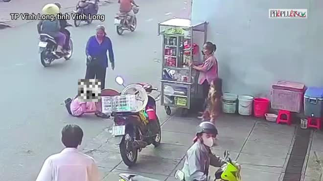 Người phụ nữ đánh con gái dã man ở Vĩnh Long. Ảnh cắt từ video.