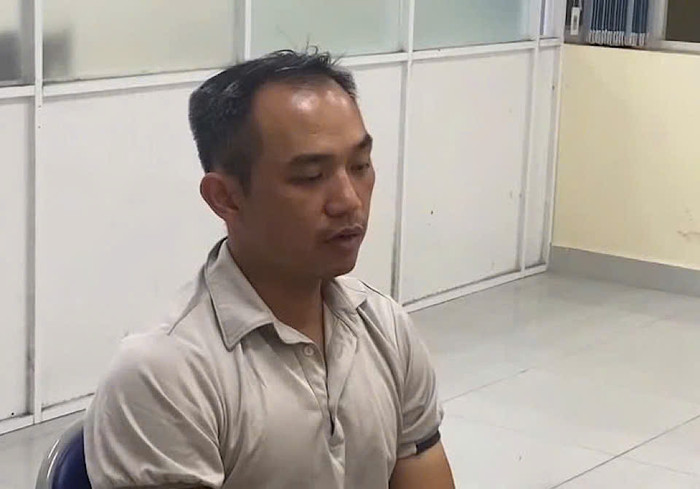 Bùi Thanh Khoa tại cơ quan công an