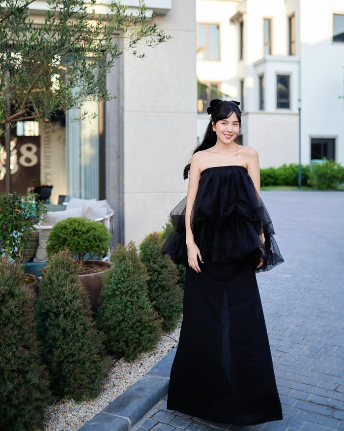 MC Mai Ngọc chuộng váy áo kín đáo, theo phong cách thanh lịch khi có tình yêu mới.