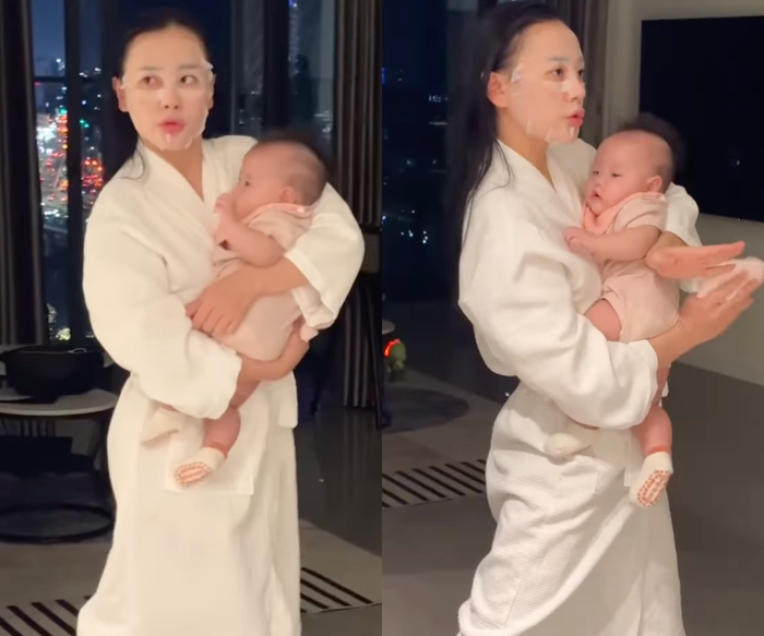 Hình ảnh Phương Oanh vừa bế con gái, vừa ôn các động tác cho bài thi của Bước Nhảy Hoàn Vũ. (Ảnh: FBNV)