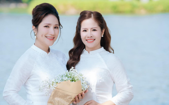 Cát Tường diện áo dài trắng đẹp ngẩn ngơ ở tuổi U50 Ảnh 2