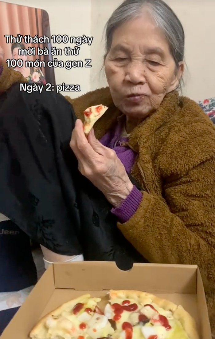Ngày thứ 2, cháu gái chuẩn bị bánh pizza cho bà thưởng thức. Ảnh: @ancungbangoai