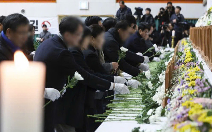 Đau thương hình ảnh lễ tưởng niệm các nạn nhân trong thảm kịch máy bay ở Hàn Quốc Ảnh 2