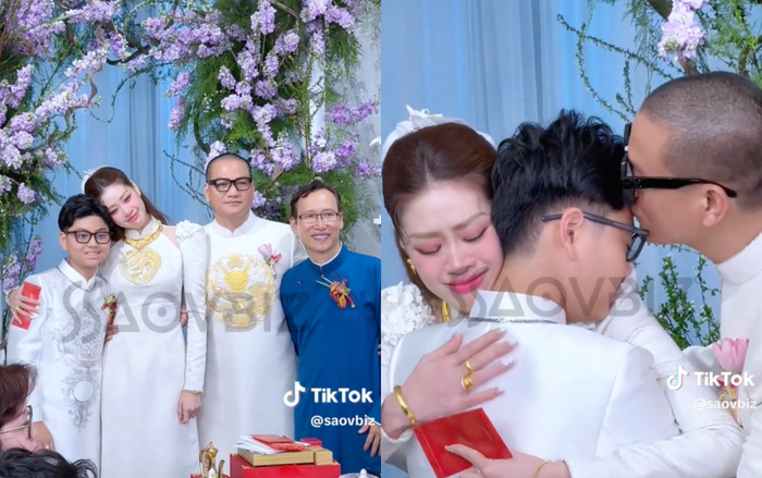 Hoa hậu Khánh Vân thân thiết bên con trai riêng của nhiếp ảnh gia Nguyễn Long. Nhóc tỳ tên thật là Minh Khôi, năm nay 11 tuổi. (Ảnh: Chụp màn hình Saovbiz)