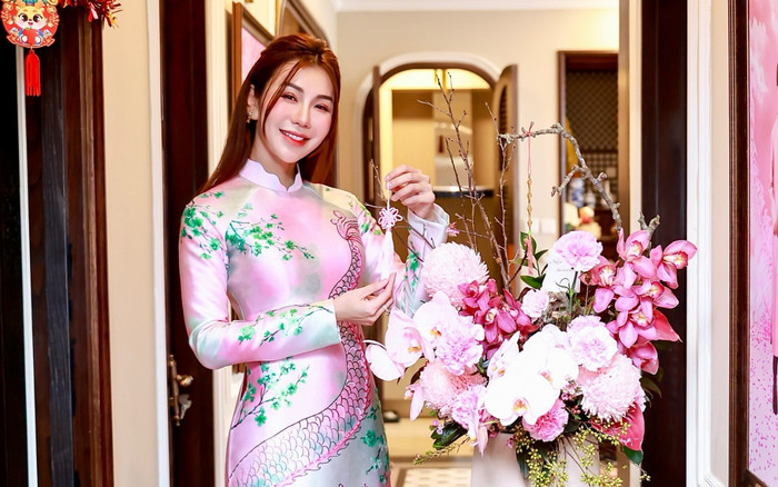 Nữ MC golf hóa nàng xuân ngày đầu năm mới, khoe ảnh quây quần bên gia đình Ảnh 2