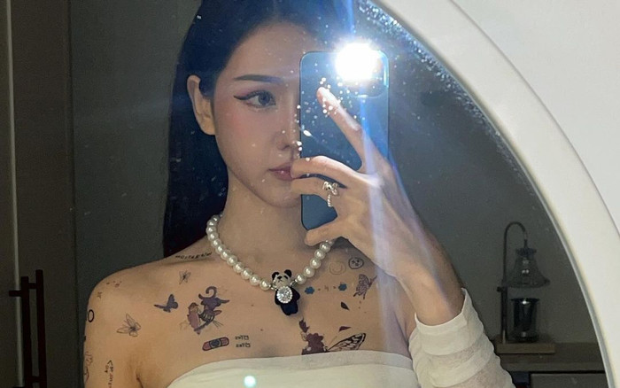 Nữ ca sĩ triệu view showbiz Việt gây xôn xao vì xăm kín người hậu chia tay? Ảnh 2