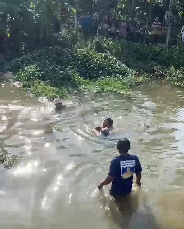 Ông Võ Toán nhảy xuống ao cứu cháu bé đuối nước