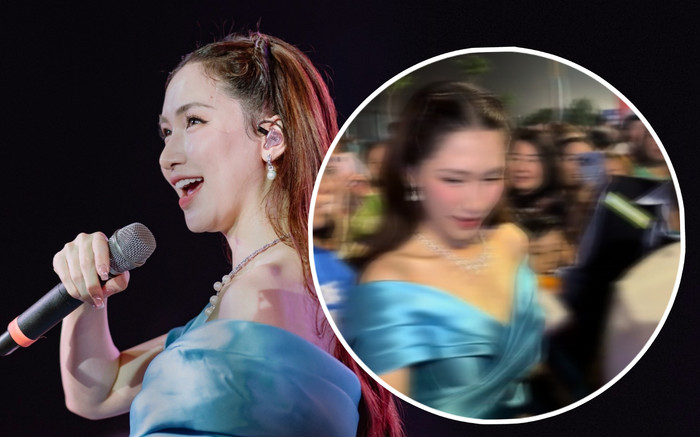 Vất vả do chiếc đầm 'quá khổ', Hòa Minzy phản ứng ra sao khi bị fan vây kín? Ảnh 2