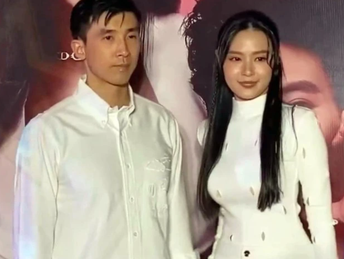 Midu và thiếu gia Minh Đạt giữ khoảnh cách trong một sự kiện trước đó.