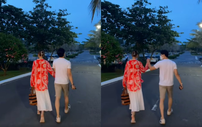 Thanh Hằng cùng ông xã tình tứ năm tay nhau kết thúc một ngày làm việc.