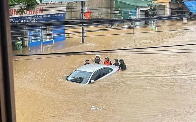 Hà Giang: Đã tìm thấy thi thể 2 bố con bị mưa lũ cuốn trôi trong lúc đi thăm người thân Ảnh 2
