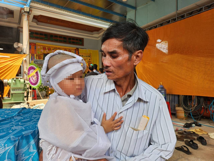 Ông Thanh và cháu Đ. Ả: báo Phụ nữ TP.HCM