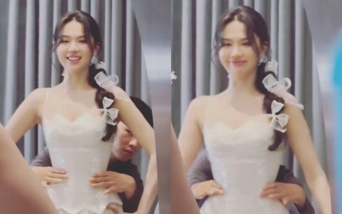 Ngọc Trinh khoe thử váy cưới, người đàn ông ân cần chăm sóc gây tò mò Ảnh 2